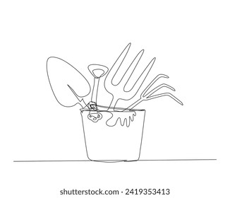 Continuous one line drawing of Gardener equipment in bucket. Shovel, rake, glove in bucket single outline vector illustration. Editable stroke.