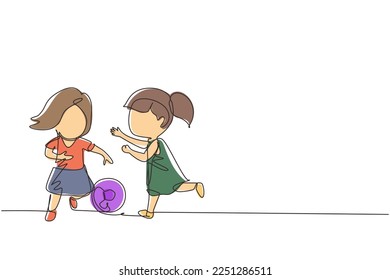 Continuous one line drawing girls playing football together. Two happy little kids playing sport at playground. Smiling children kicking ball by foot between them. Single line design vector graphic