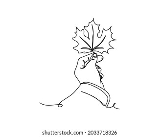 Continuous one line drawing of hand holding autumn leaf maple icon in silhouette on a white background. Linear stylized.