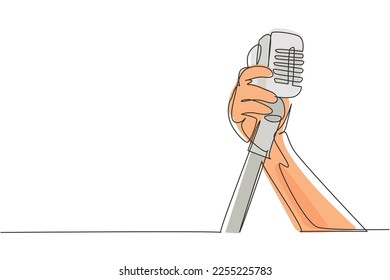 Continuous one line drawing hand holding a retro microphone over white background. Rock music live concert with old microphone. Mic for sing a song. Single line draw design vector graphic illustration