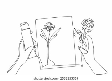 Continuous one line drawing one hand holds a rose while the other holds glue. The art of attaching flowers requires patience. Crafts. National Handmade Day. Single line draw design vector illustration