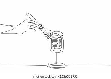 Continuous one line drawing hand wiping the mic with brush. Creates a thunderous sound. Visual effects like in the movies. Creative. International ASMR Day. Single line draw design vector illustration