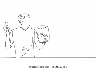 Continuous one line drawing handsome man holding potato chips in hand. Able to finish delicious crisp snacks in short time. Delectation. National Snack Day. Single line draw design vector illustration