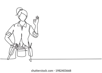 Continuous one line drawing handywoman with gesture okay ready to work on repairing the damaged part of house. Professional work. Success business. Single line draw design vector graphic illustration