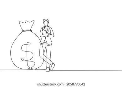 Continuous one line drawing happy businessman in suit standing near big heavy bag with dollar sign. Male leaning on money sack. Success concept. Single line draw design vector graphic illustration