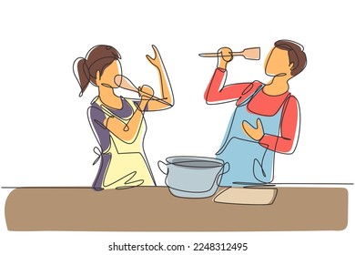 Continuous one line drawing happy romantic couple singing while cooking together, using spatula and broccoli as microphones. Kitchen fun concept. Single line draw design vector graphic illustration