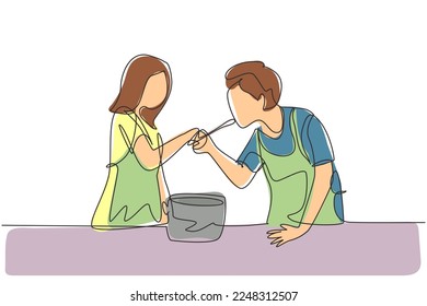 Continuous one line drawing happy husband tasting food given by his young beautiful wife. Cooking for lunch together in cozy kitchen at home. Single line draw design vector graphic illustration