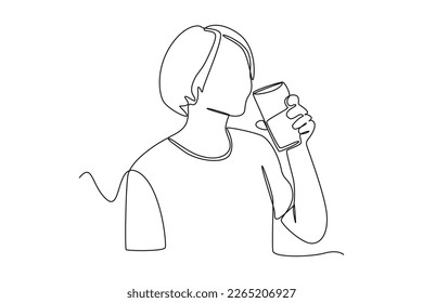 Continuous one line drawing happy girl drinking water. Healthcare at home concept. Single line draw design vector graphic illustration.