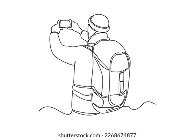 Continuous one line drawing happy boy take a photo with smartphone. Travel experience concept. Single line draw design vector graphic illustration.