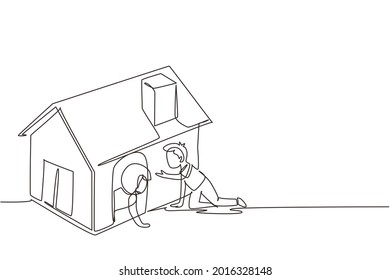 Continuous one line drawing kids playing cardboard box toy house together. Boy and girl playing in and out of toy home. Child sitting in playhouse. Single line draw design vector graphic illustration