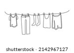 Continuous one line drawing of laundry hang on clothline. Vector illustration	
