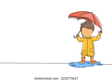 Continuous one line drawing little boy play wear raincoat and umbrella. Child playing in rain. Kid in raincoat and rubber boots plays in rain, puddle splashing. Single line draw design vector graphic