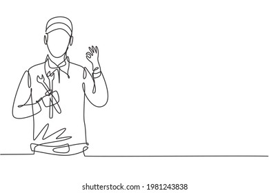 Continuous one line drawing male mechanic with gesture okay and holding wrench works to fix broken car engine in garage. Success business concept. Single line draw design vector graphic illustration