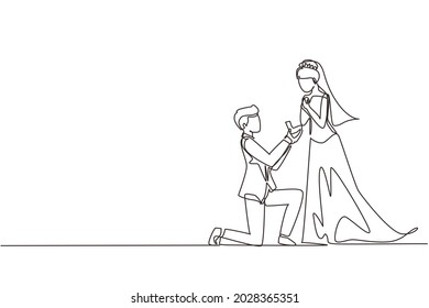 Continuous one line drawing man kneeling holding engagement ring proposing woman marry him marriage with wedding dress. Guy on knees proposing girl to marry. Single line draw design vector graphic