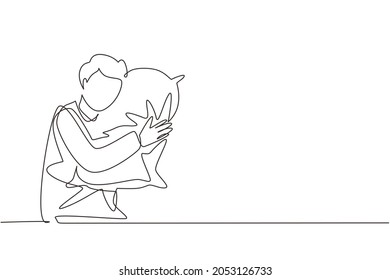 Continuous one line drawing man sleeping and hugging pillow. Sideways sleep position with no bed, young guy lying on his side propped on cushion. Single line draw design vector graphic illustration