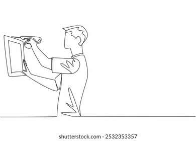 Dibujo continuo de una línea: un hombre taladra la pared con un taladro e instala un marco decorativo de madera. Hágalo usted mismo para la satisfacción interior. Día Nacional del bricolaje. Ilustración vectorial de diseño de dibujo de línea única