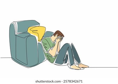 Continuous one line drawing man sitting on floor leaning on single sofa, cover face with both palms. Layoff. No income. Sad. National Anxiety Screening Day. Single line draw design vector illustration