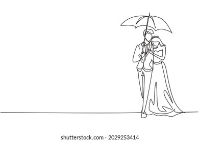 Continuous one line drawing married couple man woman, girl and boy walking holding umbrella under rain smiling hugging. Romantic couple at rainy autumn weather. Single line draw design vector graphic