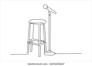 Continuous one line drawing of microphone and stool on stand up comedy stage. Equipment at night club or bar for stand up comedian performance.