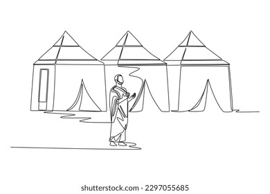 Continuous one line drawing a Muslim with his Ihram dress doing wukuf in Arafah. Hajj and umrah concept. Single line draw design vector graphic illustration.