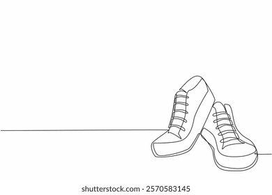 Continuous one line drawing a pair of stacked sneakers. Placement on store displays. Modern casual shoes. Fashion. National Two Different Colored Shoes Day. Single line draw design vector illustration