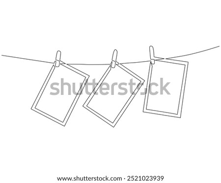 Continuous one line drawing of photo frame with clips. One line drawing illustration of photo frame hanging on the rope. National photography day concept single line. Editable outline