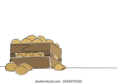 Continuous one line drawing potatoes in a wooden box and some potatoes scattered around. The month of potato harvest. International Day of the Potato. Single line draw design vector illustration