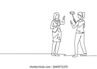 Continuous one line drawing professional shooting team record video interview for public blog vlog with smartphone and monopod stick. Woman journalist as news anchor. Single line draw design vector