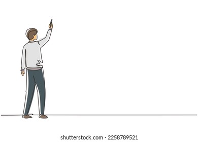 Continuous one line drawing rear view of man teacher or student writing formulas on classroom chalkboard holding chalk in right hand. University or school education. Single line draw design vector