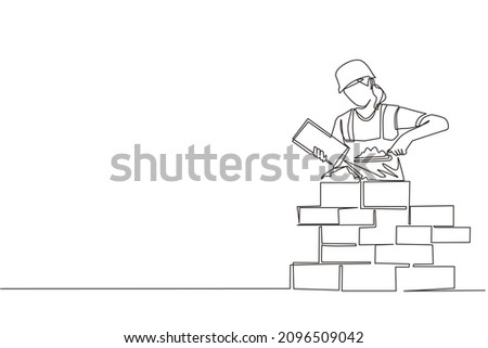 Continuous one line drawing repairwoman building brick wall. Construction worker in uniform and helmet doing work. Builder concept. Repair work services. Single line draw design vector illustration
