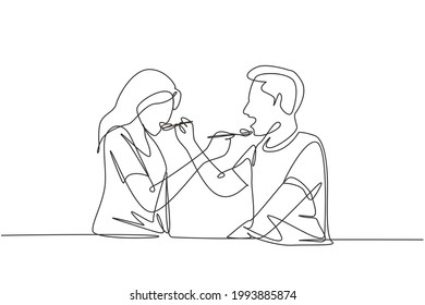 Continuous one line drawing romantic young couple feeding each other. Having fun dinner together at restaurant. Celebrate wedding anniversaries. Single line draw design vector graphic illustration