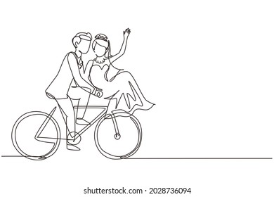 Continuous one line drawing romantic married couple riding bicycle. Man and woman in love with wedding dress. Happy married couple cycling together. Single line draw design vector graphic illustration