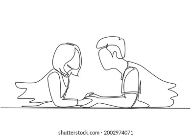Continuous one line drawing side view of beautiful young couple holding hands, looking at each other and smiling while lying on floor at home. Single line draw design vector graphic illustration
