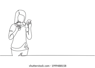 Continuous one line drawing smiling beautiful woman looking at mobile phone and holding glass of orange juice while having breakfast at cozy home. Single line draw design vector graphic illustration