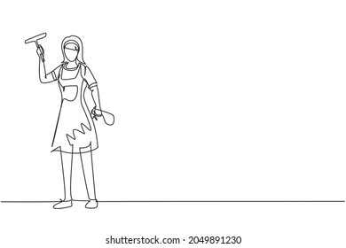 Continuous one line drawing smiling cleaning staff member is wiping the window with brush and spray. Concept of woman cleaning windows from dust in different premises. Single line draw design vector