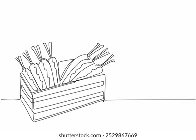 Continuous one line drawing some carrots in a wooden box. Distributes goodness as a source of vitamins. Sweet. Mineral. Healthy. International Carrot Day. Single line draw design vector illustration