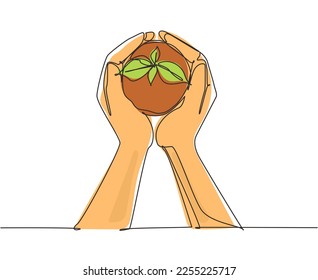 Continuous one line drawing two hands carrying bag of potting seedlings to be planted into soil. Environment earth day in hands of trees growing seedlings. Single line draw design vector illustration