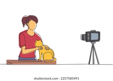 Continuous one line drawing vet blogger sitting in front of camera with cats and recording video blog about animals, pets. Zoo psychologist creating content for vlog. Single line draw design vector