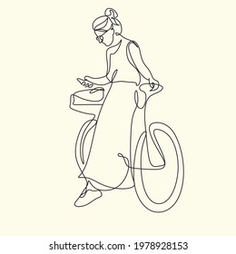 Continuous one line drawing woman girl on a bicycle