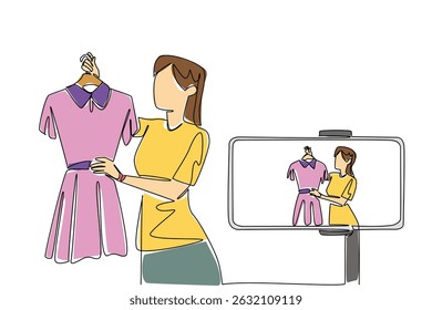 Continuous one line drawing woman holds clothes on a hanger and doing live streaming using a smartphone. Online business. Review. National Streaming Day. Single line draw design vector illustration