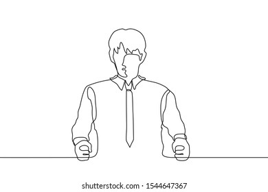continuous one line drawing a young man sits at a table clenching his hands in fists. The concept of determination, anger, decision making. It can be used for animation. Vector