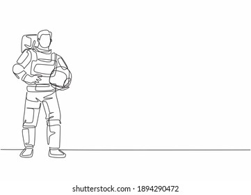 Continuous one line drawing of young male astronaut pose standing and holding helmet. Professional job profession minimalist concept. Single line draw design vector graphic illustration