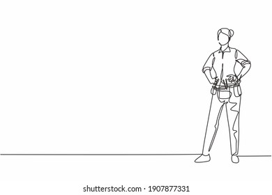 Continuous one line drawing of young beauty female mechanic standing with hands on hip. Professional job profession minimalist concept. Single line draw design vector graphic illustration