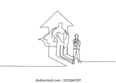 Continuous one line drawing young smart male worker standing with superhero shadow reflect to the wall. Success business manager minimalist concept. Single line draw design vector graphic illustration