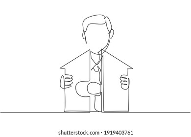 Continuous one line drawing young handsome male worker arrange piece of puzzle into house building. Success business manager minimalist concept. Single line draw design vector graphic illustration