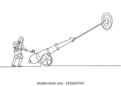 Continuous one line drawing young female worker focus fire on cannonball weapon to hit business target. Success business manager minimalist concept. Single line draw design vector graphic illustration