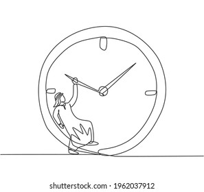 Continuous one line drawing young Arab male worker hanging on clockwise of giant analog clock. Business time discipline metaphor concept. Single line draw design vector graphic illustration.