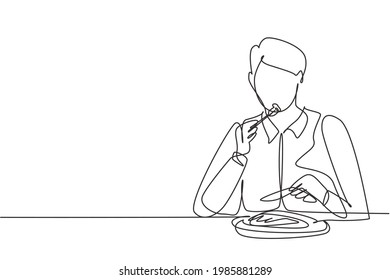 Continuous one line drawing young man having steaks meal with fork and knife around table. Enjoy lunch at restaurant. Delicious and healthy food. Single line draw design vector graphic illustration