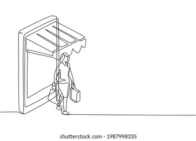 Continuous one line drawing young woman coming out of canopy smartphone screen holding shopping bags. Sale, digital lifestyle, consumerism concept. Single line draw design vector graphic illustration