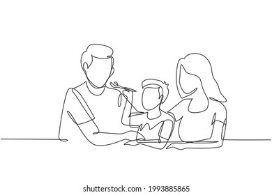 Continuous one line drawing young family having fun together in modern restaurant. Boy feeds his father with love. Happy little family concept. Single line draw design vector graphic illustration